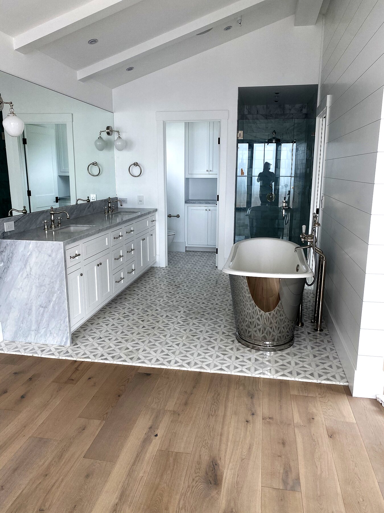 Primary bathroom remodel with freestanding tub and tile shower by Grain and Stain Renovations in Hendersonville TN